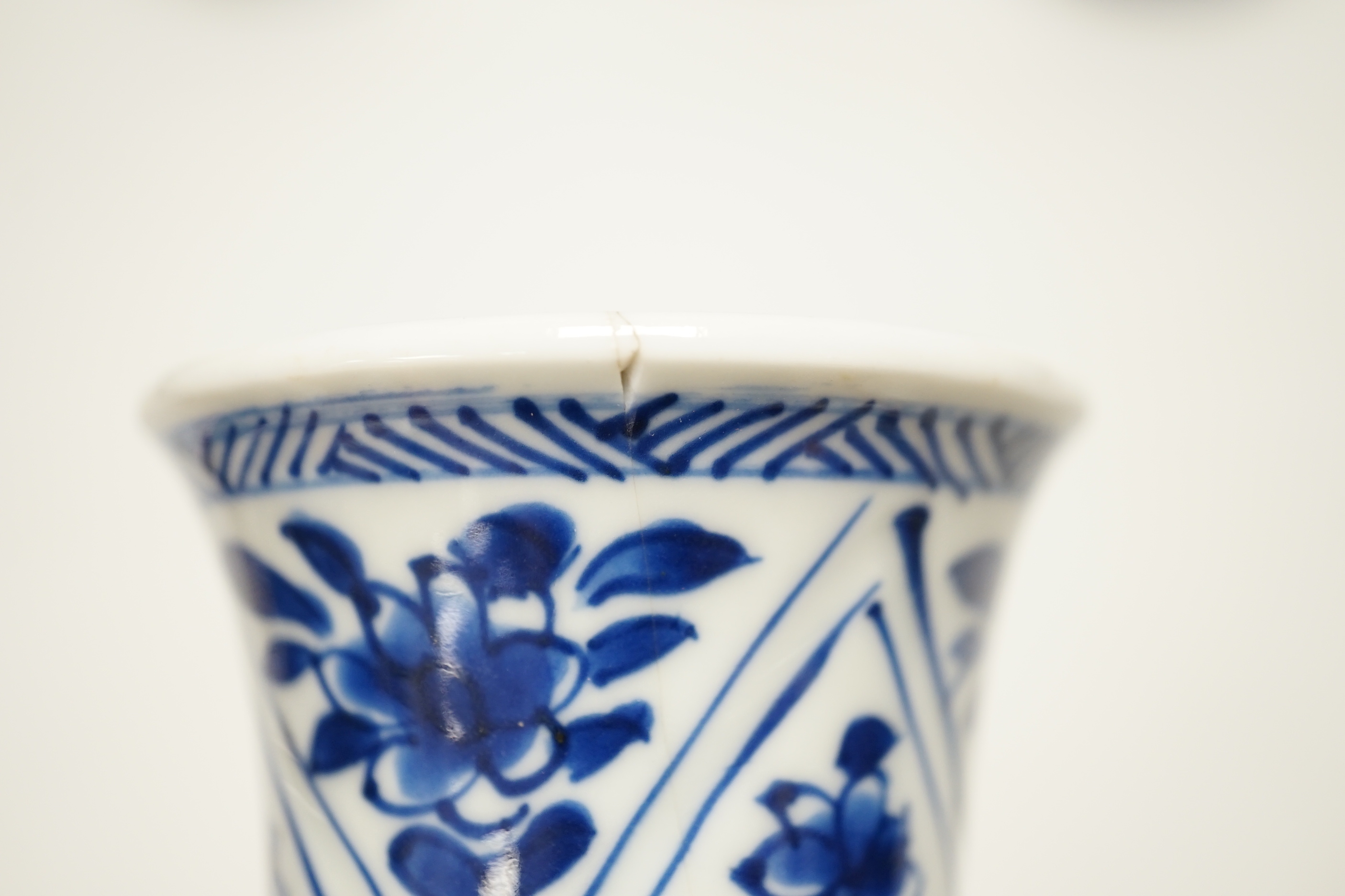 Four Chinese Kangxi period blue and white small vases, tallest 16cm high